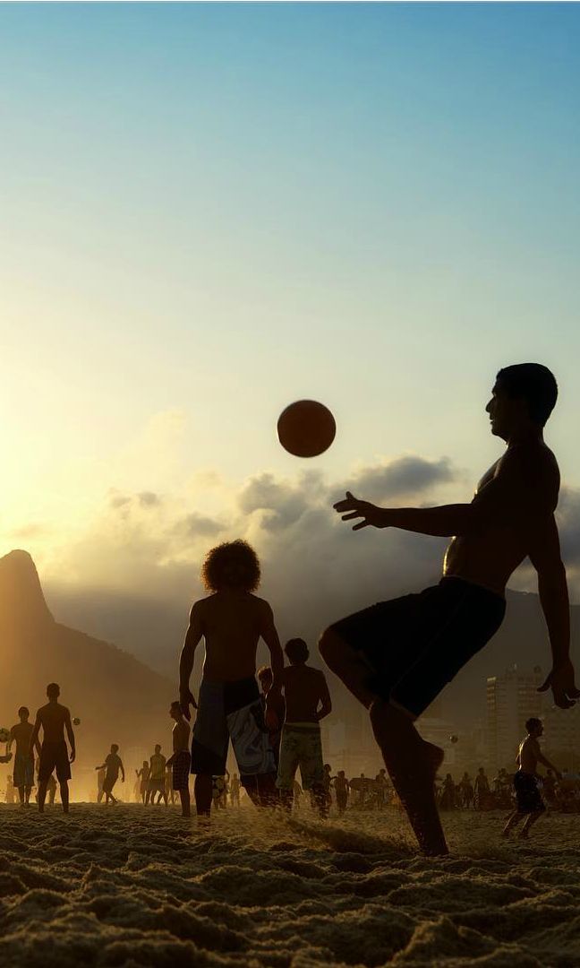 Beach football at sunset in Rio de Janeiro